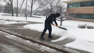 shoveling sidewalk